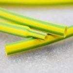 Image of yellow/green 6mm heat shrink tubing, 100m roll, for ground wire insulation