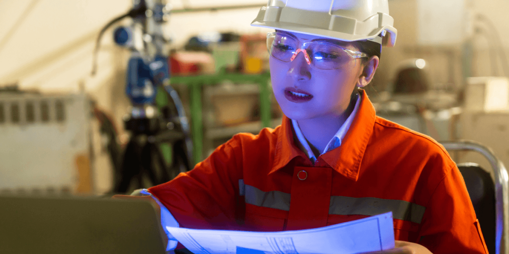 female-engineer-specialist-with-measuring-machine-with-manipulator-arm-laptopthreedimensional-coordinate-measurement