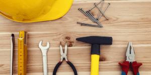 Essential industrial tools and heavy equipment used for large construction projects on a commercial building site.